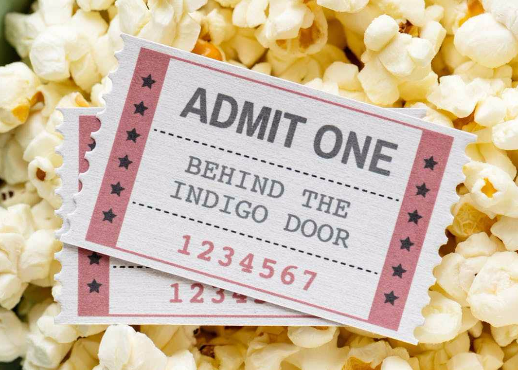 two white and red admission tickets